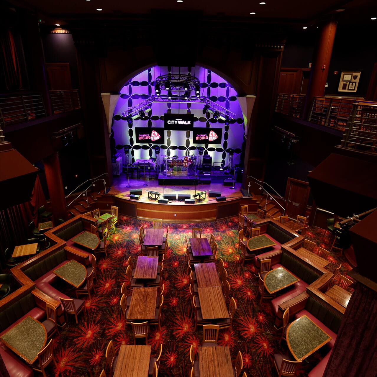 Event attendee on stage at CityWalk’s Rising Star.