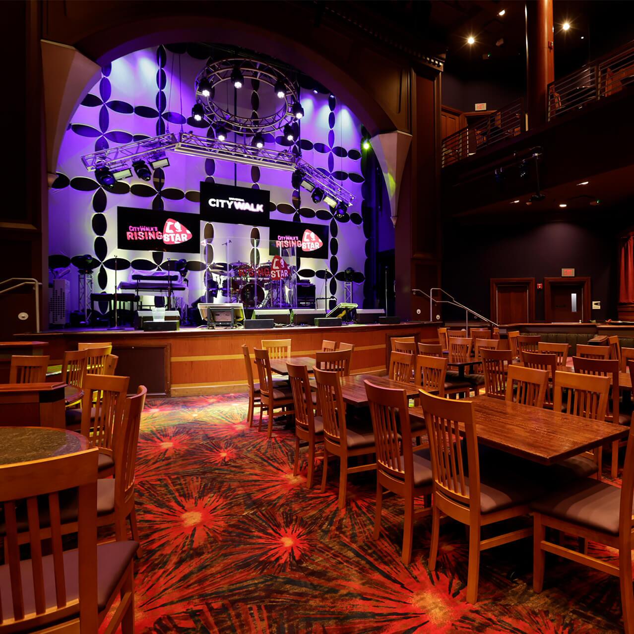 Event attendee on stage at CityWalk’s Rising Star.