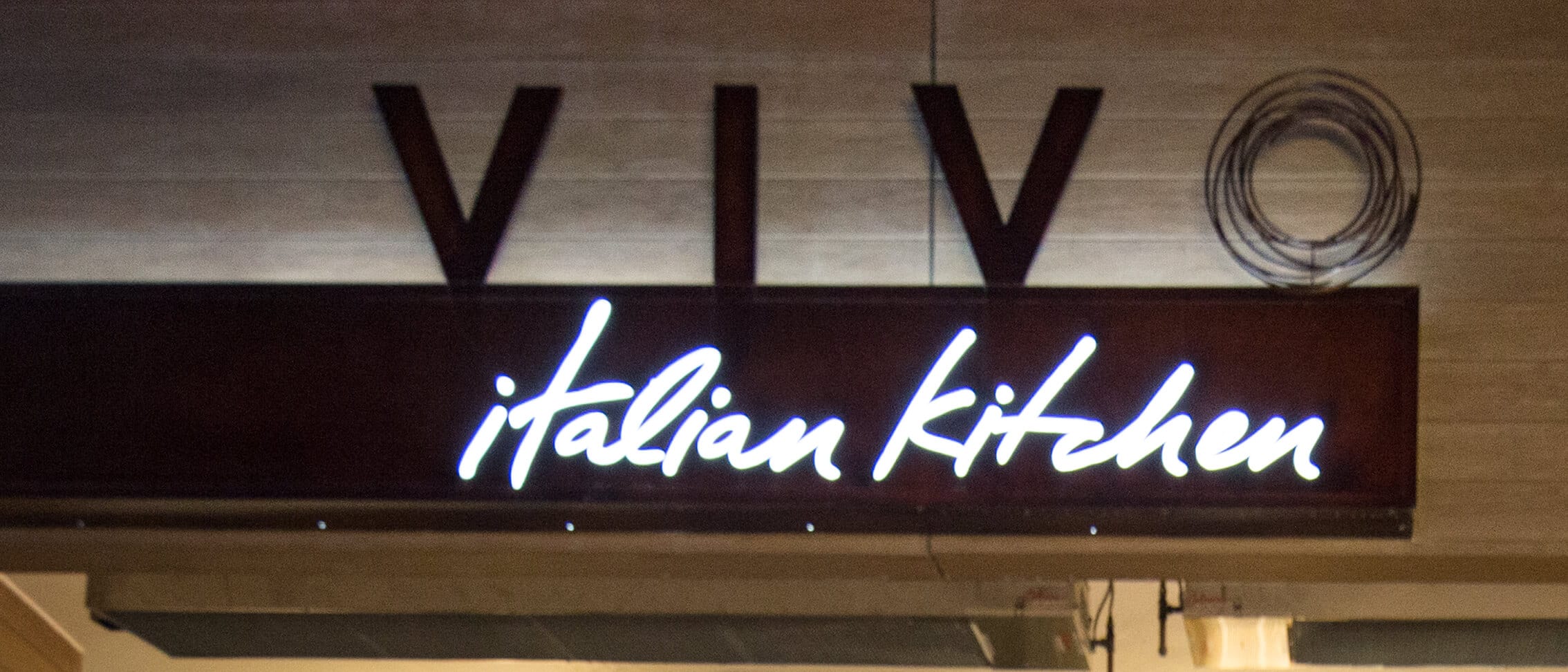 A view of Vivo Italian Kitchen sign at Universal CityWalk Orlando.