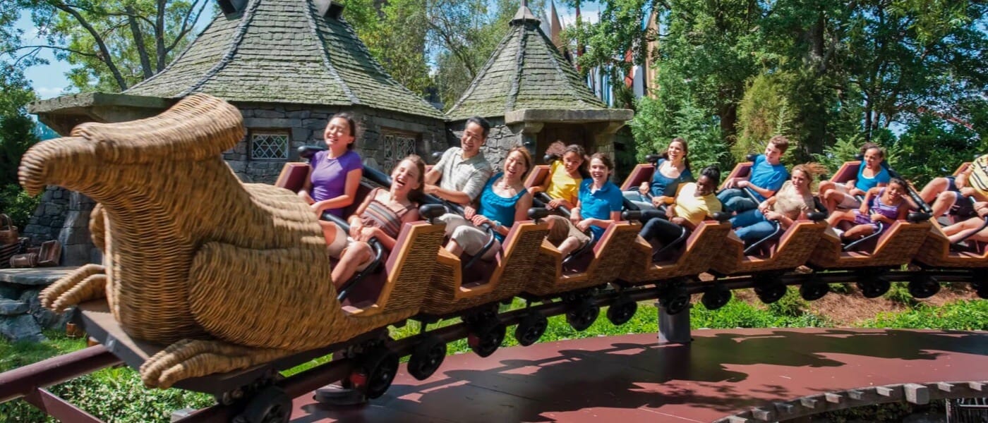 Guests enjoying the mild roller coaster fun of Flight of the Hippogriff at The Wizarding World of Harry Potter in Universal Islands of Adventure in Orlando.