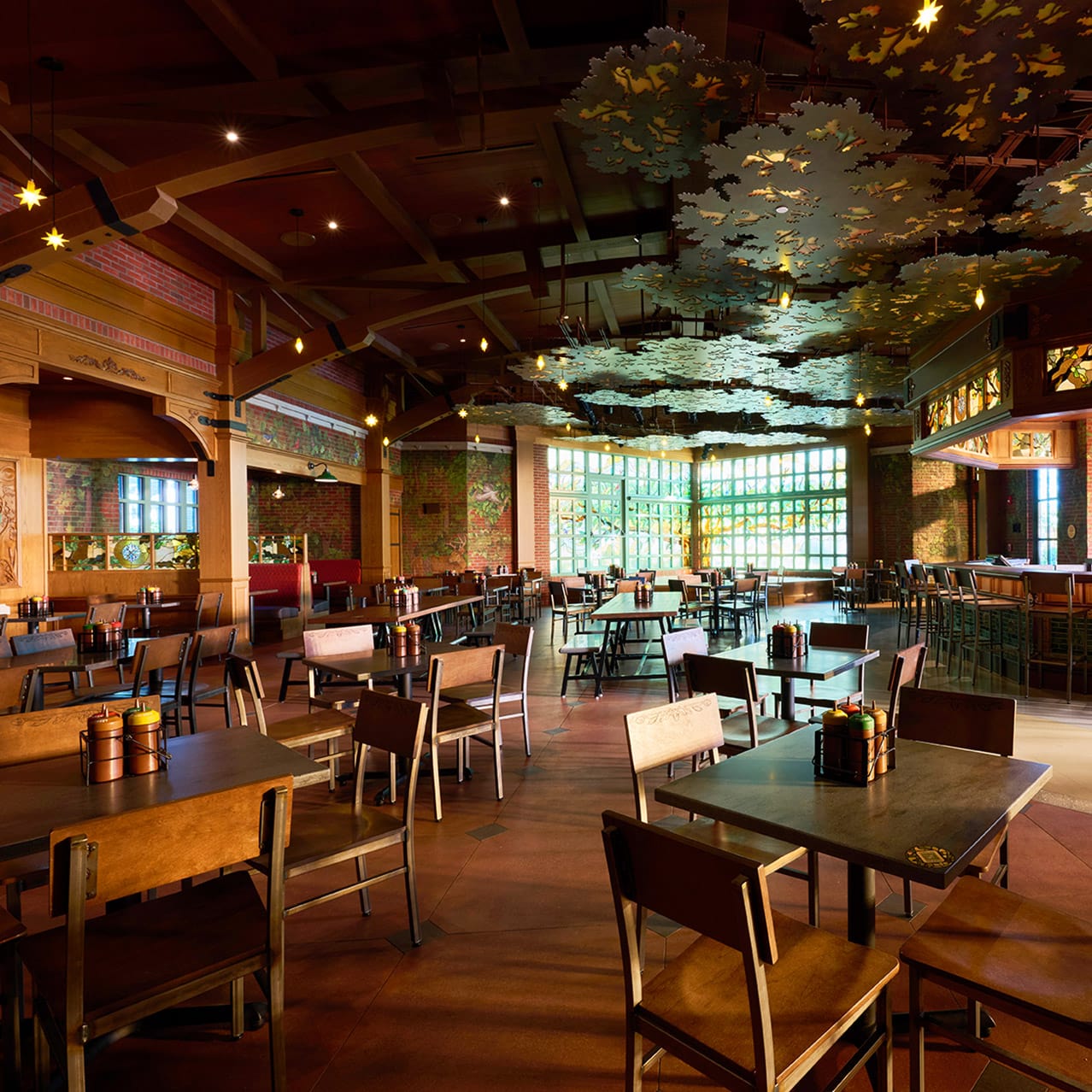 The dining room in The Oak & Star Tavern at Universal Epic Universe.