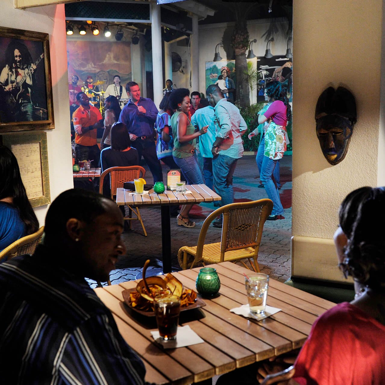 Guests dining and dancing at Bob Marley A Tribute to Freedom at Universal CityWalk located at Universal Orlando Resort.