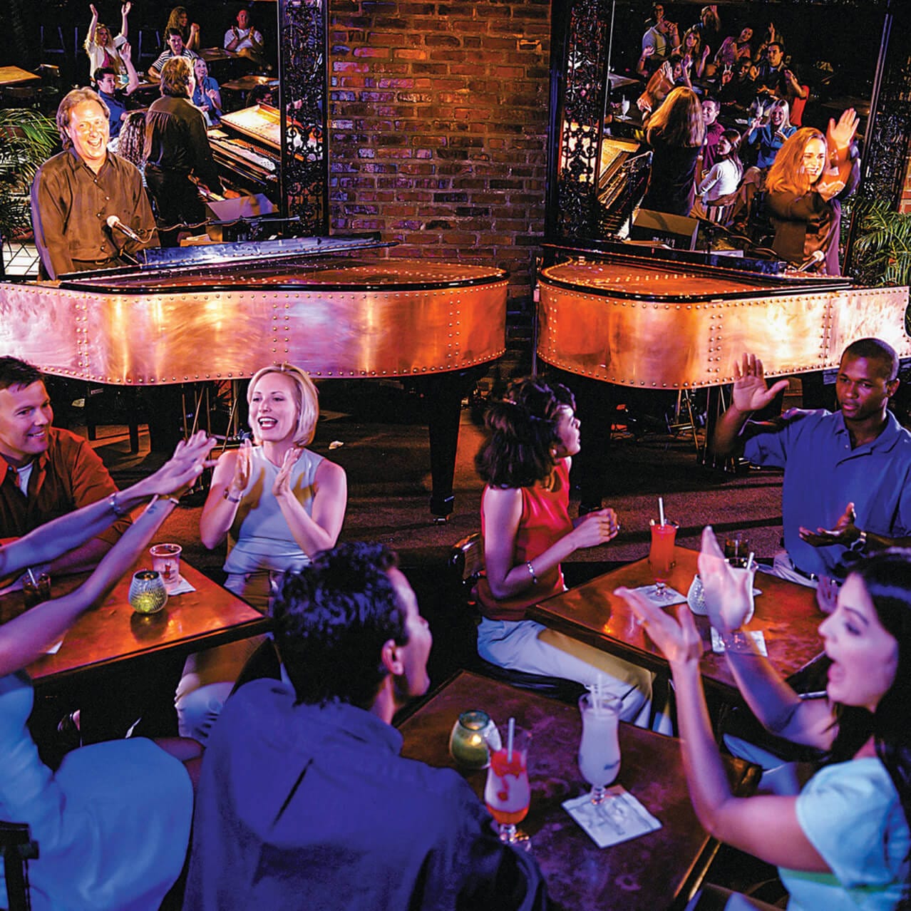 An audience enjoys a live performance in Pat O’Brien’s at Universal CityWalk located at Universal Orlando Resort.