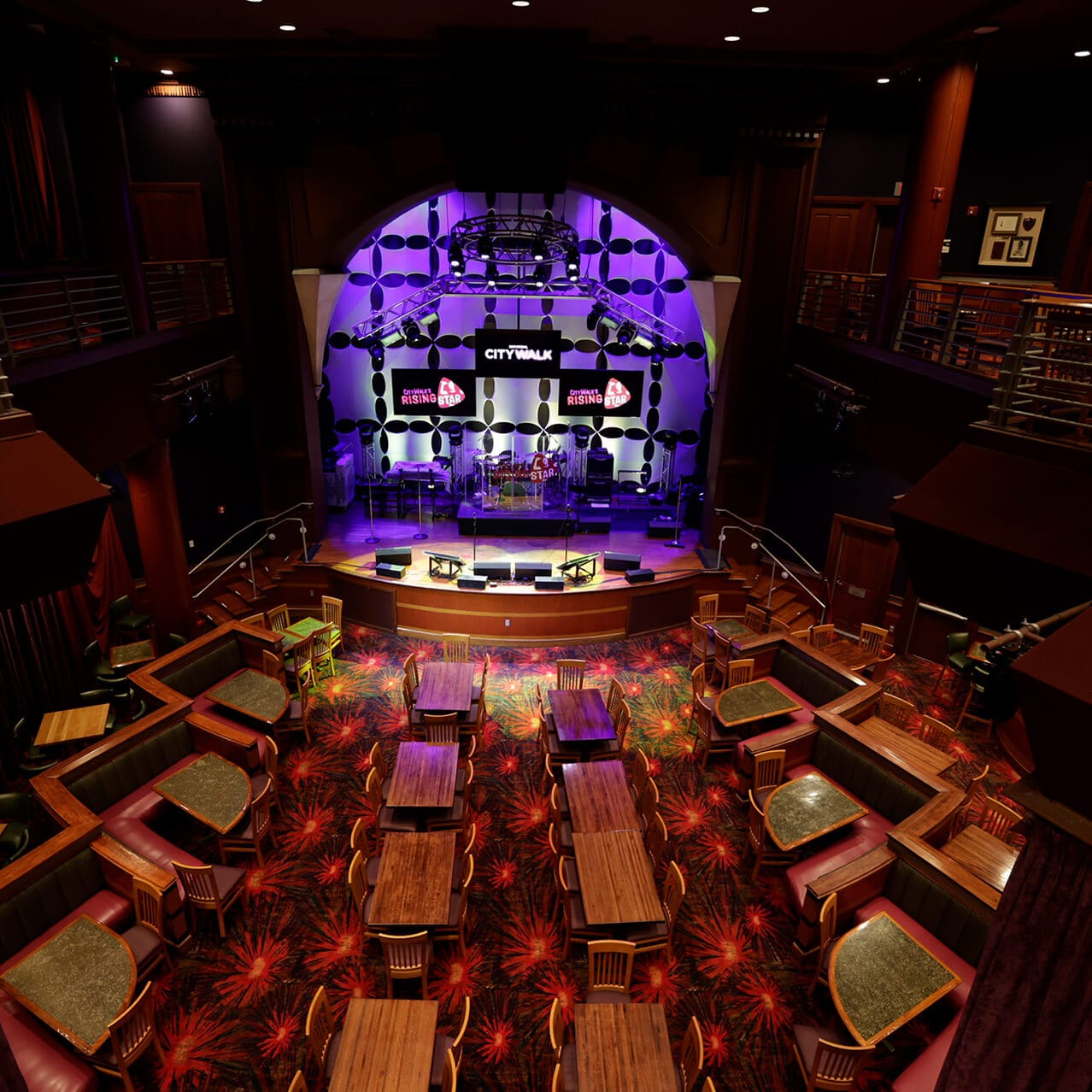 Event attendee on stage at CityWalk’s Rising Star.