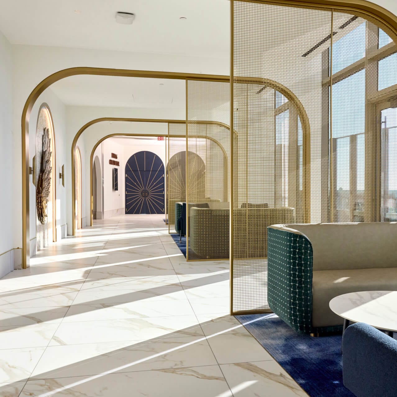 Beautiful details of celestial patterns and gold adorn the interior of Universal Helios Grand Hotel, with a casual, elegant Mediterranean-inspired feel throughout.
