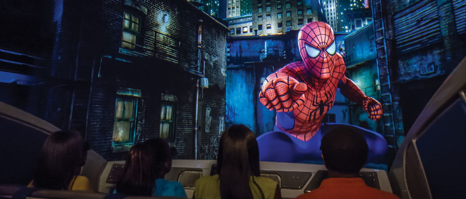 Guests riding the Amazing Adventures of Spider-Man ride