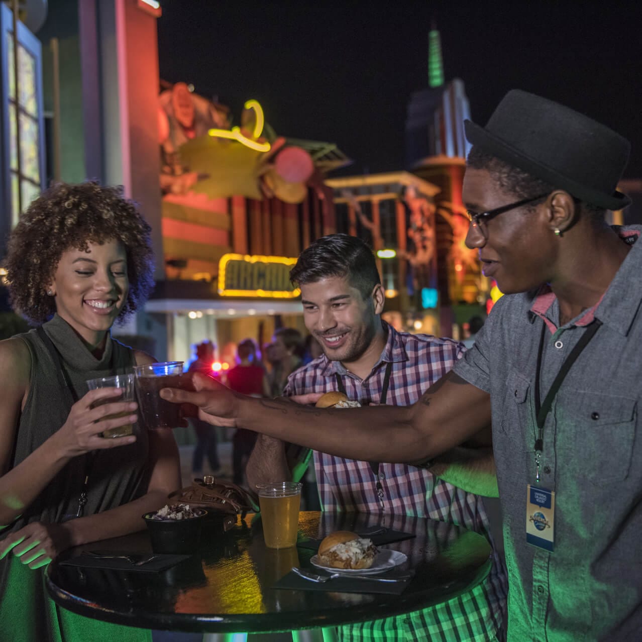 Smiling guests dining at the Marvel Super Hero Island