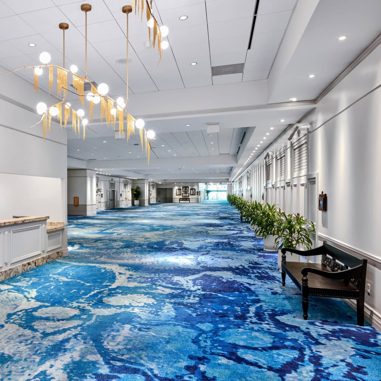 Tables setup for an event in a large meeting room