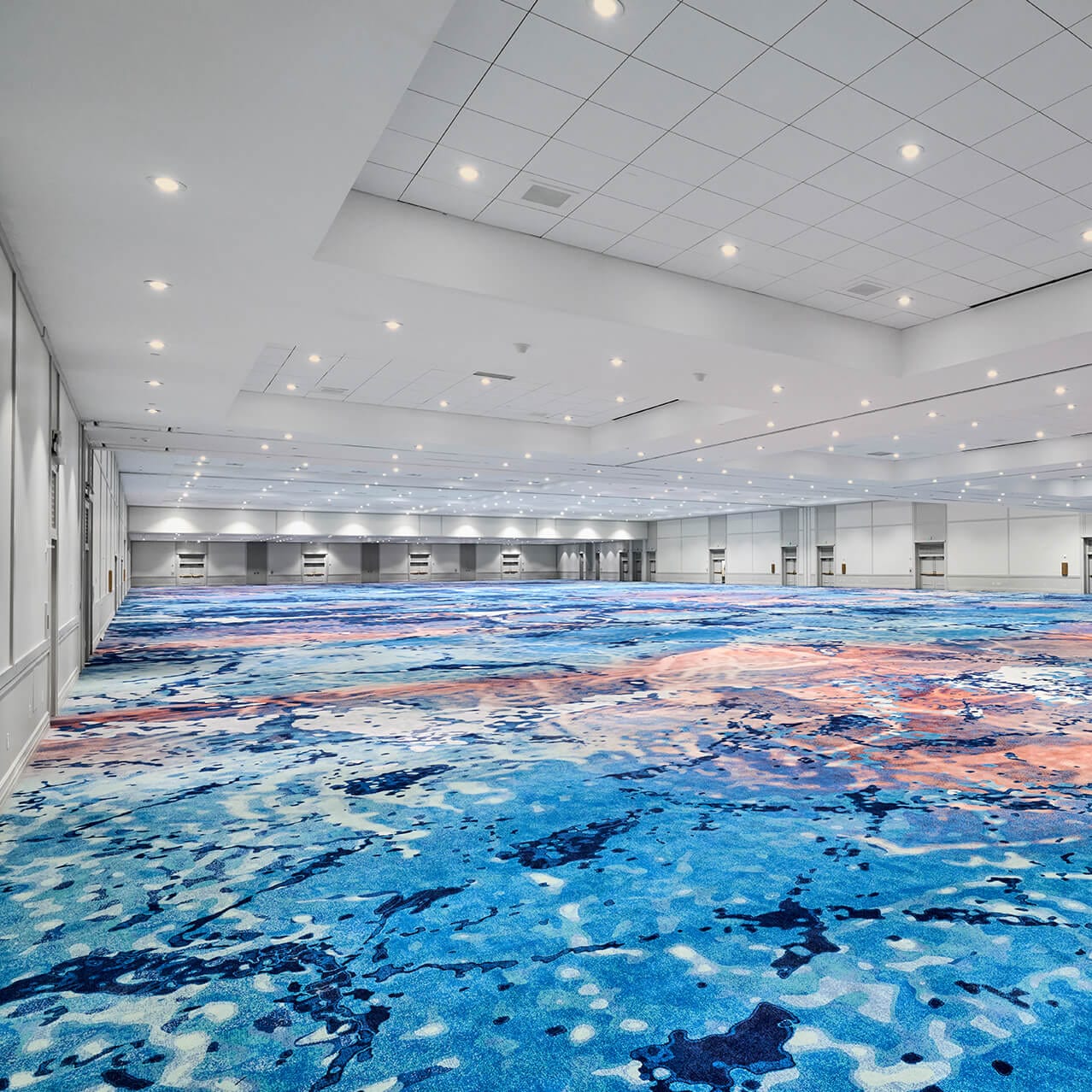 Interior view of the Pacifica Ballroom space with new ocean inspired carpet located at Loews Royal Pacific Resort at Universal Orlando.