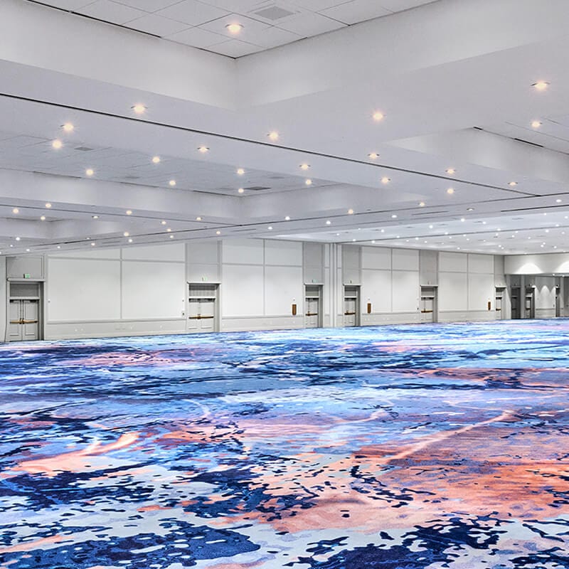 Interior view of the Pacifica Grand Ballroom space with new ocean inspired carpet at Loews Royal Pacific Resort at Universal Orlando.