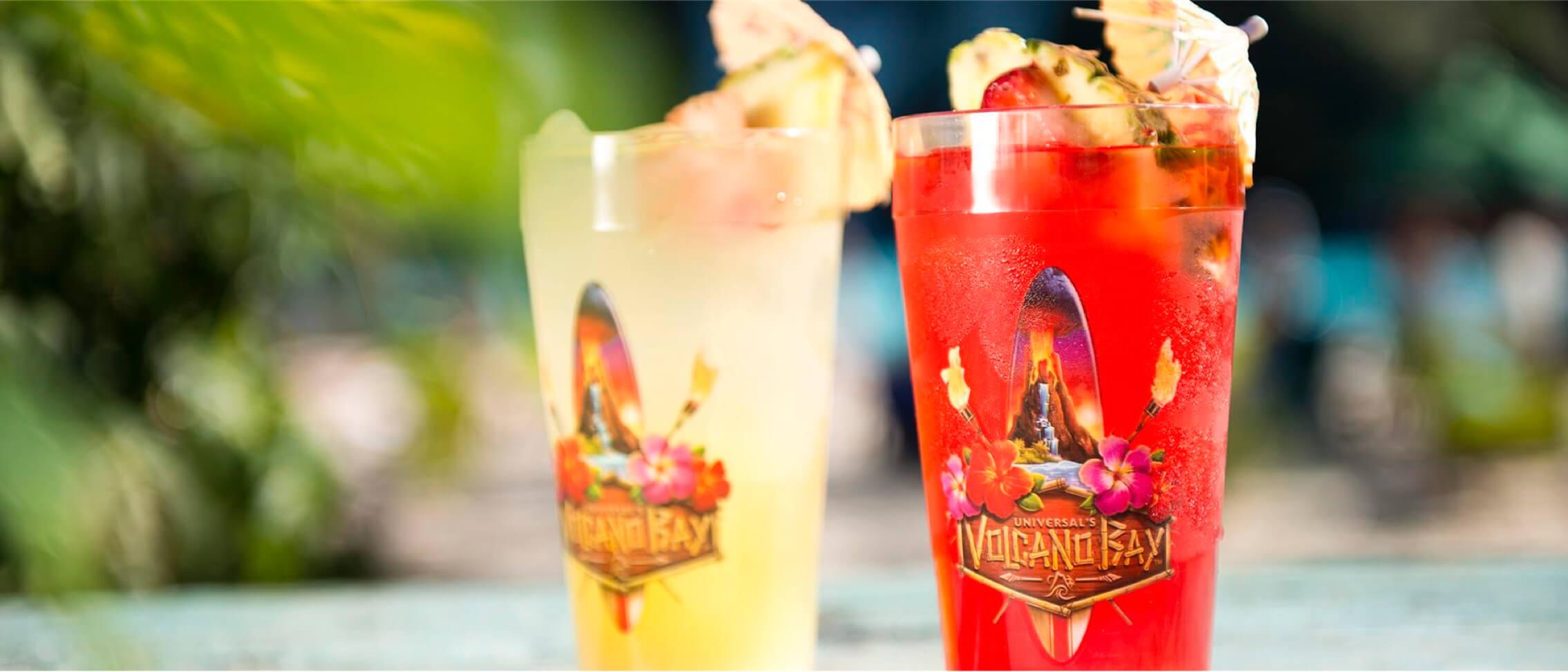 Table view of two deliciously tropical cocktails at the Dancing Dragons Boat Bar at Universal Volcano Bay