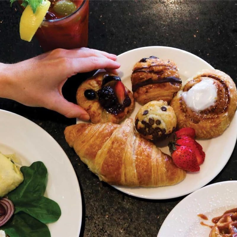 Brunch dishes on display on a table at Sunday Brunch at The Kitchen in Hard Rock Hotel.