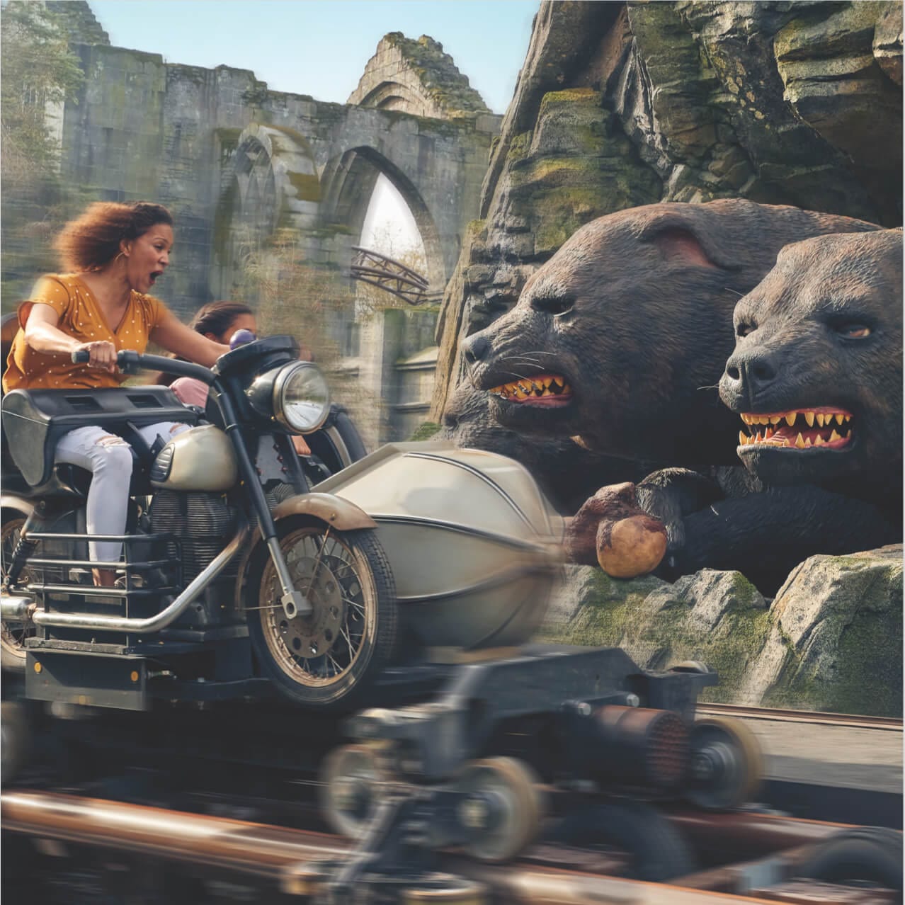 Screaming riders on Hagrid's Magical Creatures Motorbike Adventure™ approach Fluffy, Hagrid’s three-headed dog.