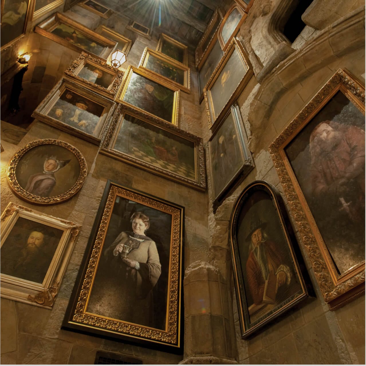 The view looking up inside the queue for the thrill ride Harry Potter and the Forbidden Journey shows wizard portraits inside Hogwarts castle at Universal's Islands of Adventure in Orlando.