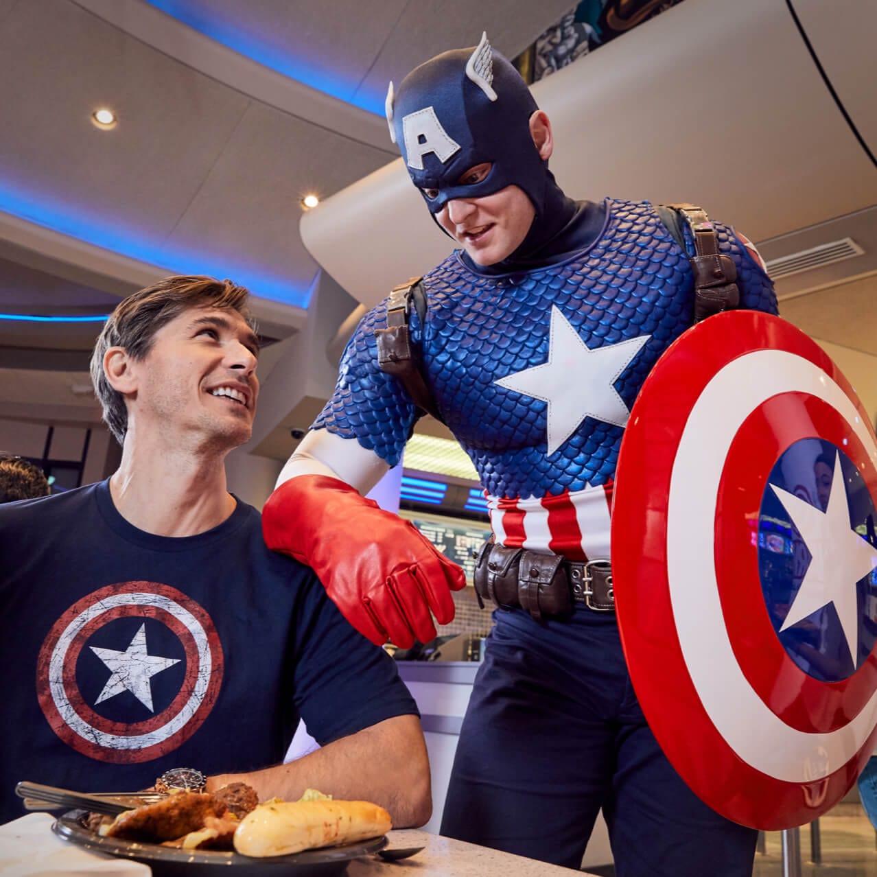 Captain America chats with a fan at the Marvel Character Dinner at Universal’s Islands of Adventure.