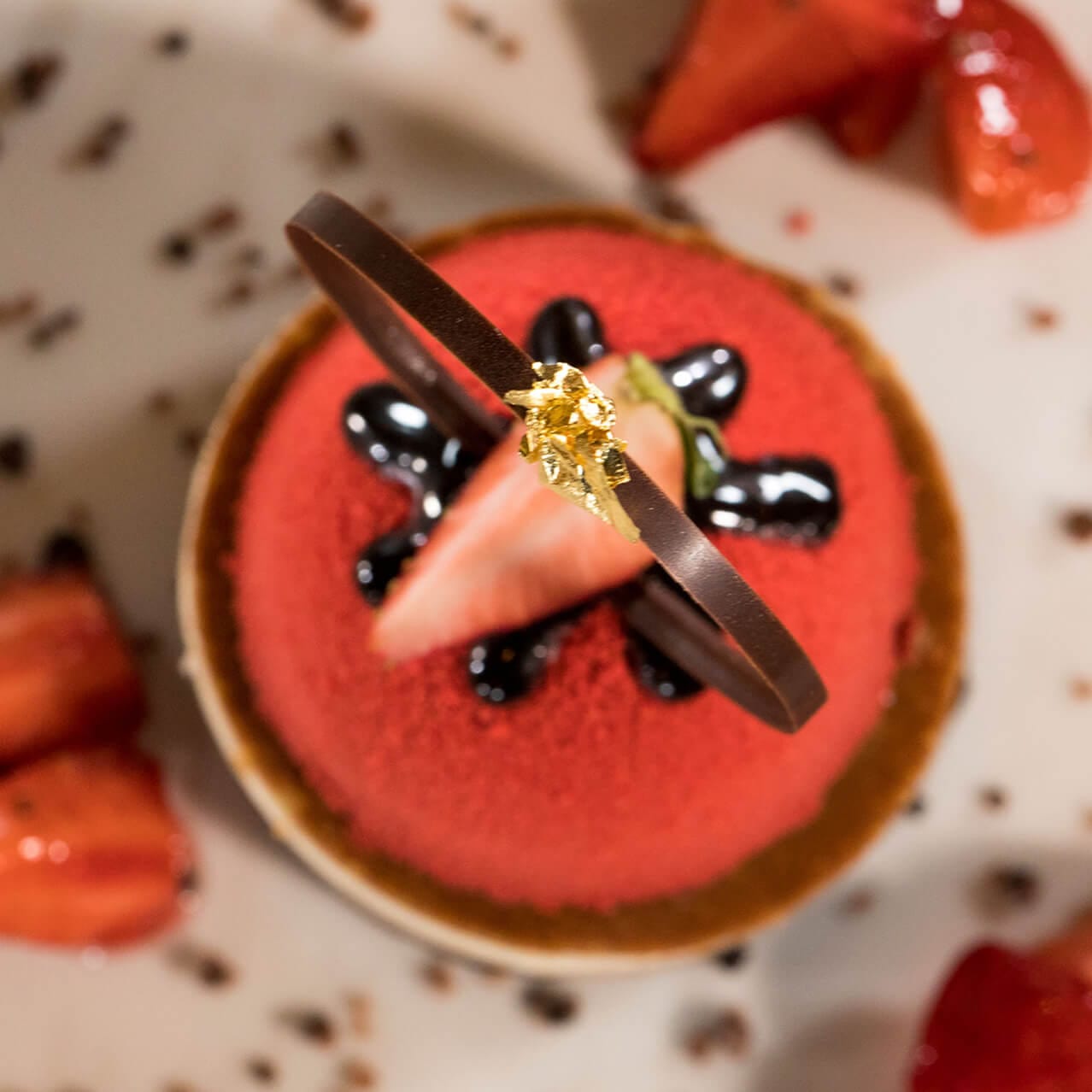 An overhead image of a strawberry and chocolate dessert at Mama Della's Ristorante at Portofino Bay Hotel.