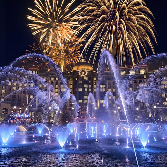 Fireworks and illuminated fountains during the Celestial Goodnight nighttime show at Universal Epic Universe.