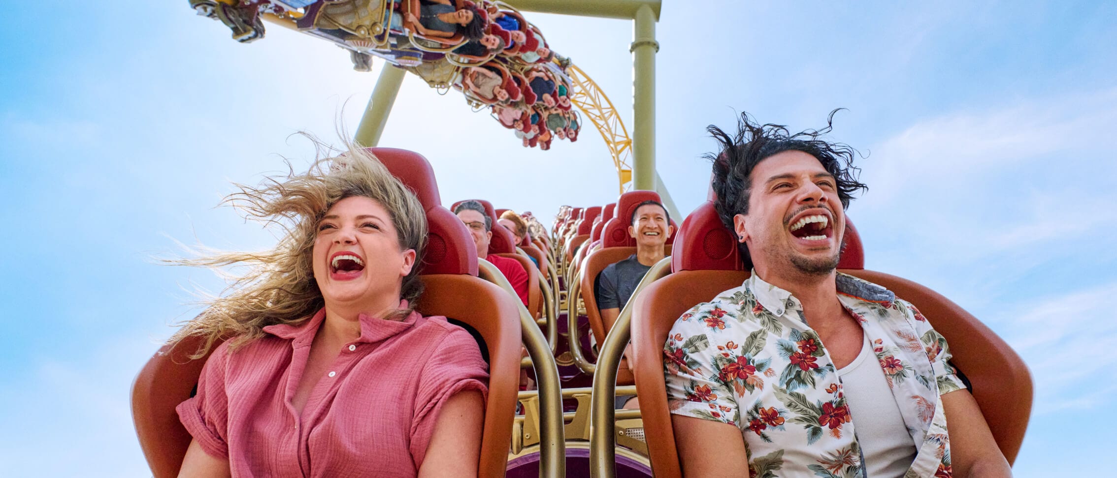 Riders scream as they fly through the air on Stardust Racers dual-launch rollercoaster in Celestial Park at Universal Epic Universe.