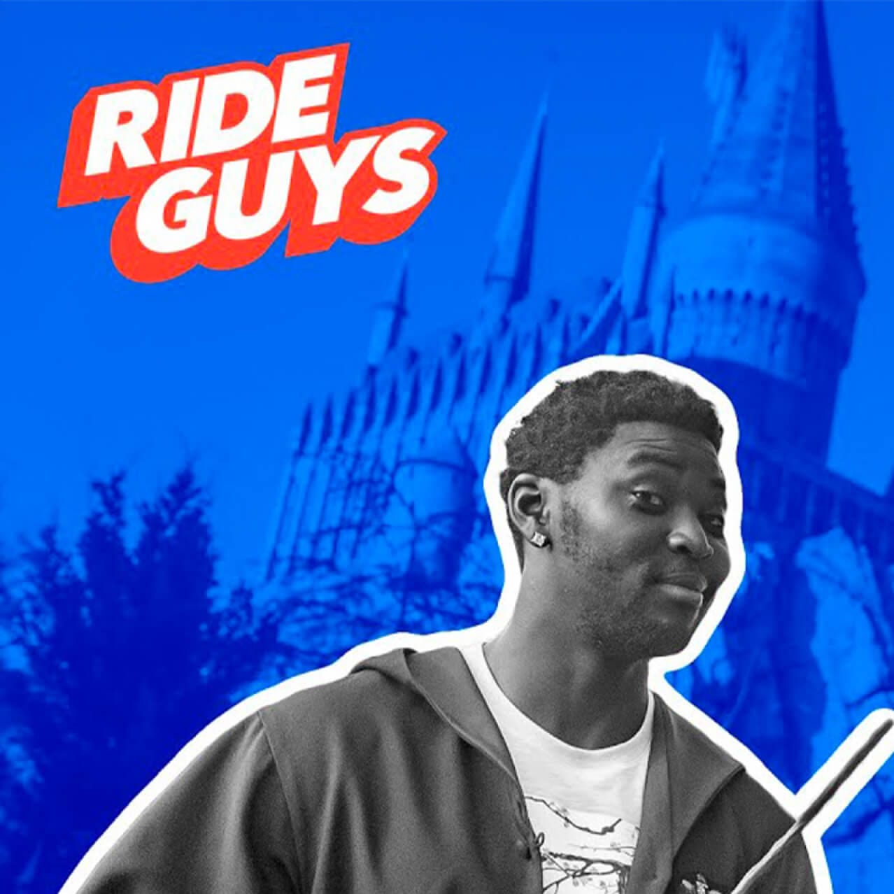 The Ride Guys dressed in wizarding robes, hold wands in front of the Hogwarts™ Castle at The Wizarding World of Harry Potter™ Hogsmeade™ in Universal Islands of Adventure.