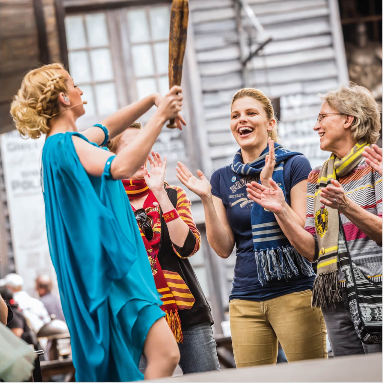 Guest enjoying the Celestina Warbeck and the Banshees live show in Diagon Alley at Universal Studios Orlando.