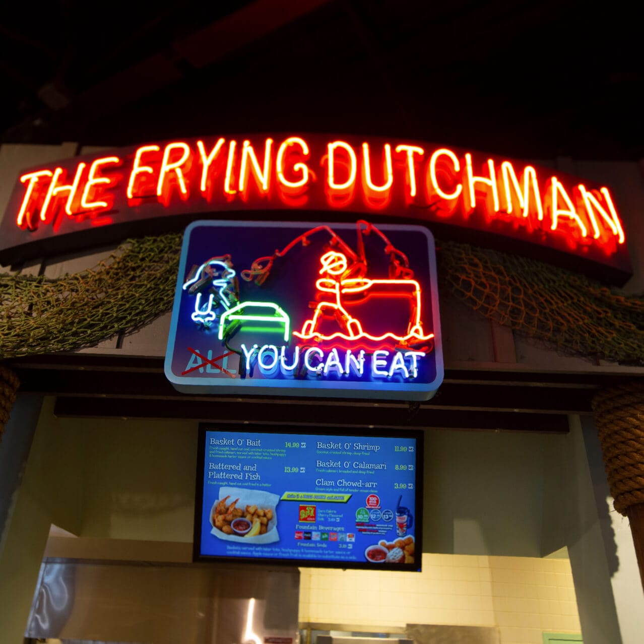 The neon sign outside The Frying Dutchman fish restaurant at Universal Studios Orlando that is a recreation of the famous location from The Simpsons TV show.
