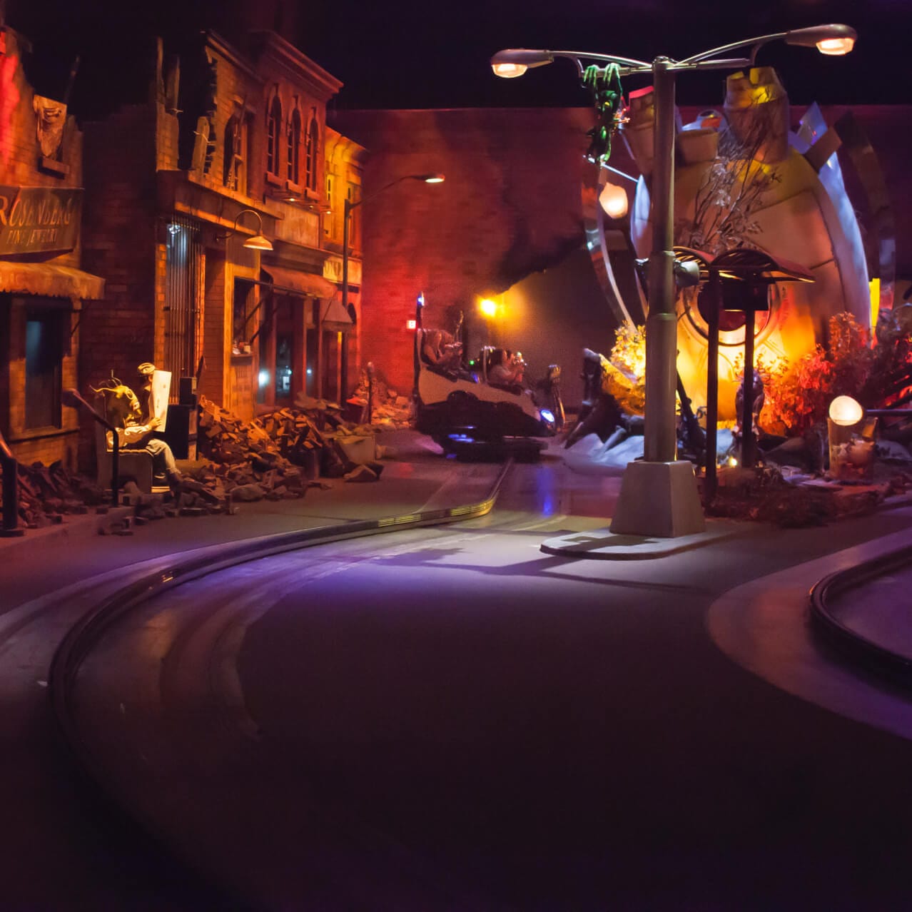 A dark city street hides aliens in the Men In Black Alien Attack ride at Universal Orlando.