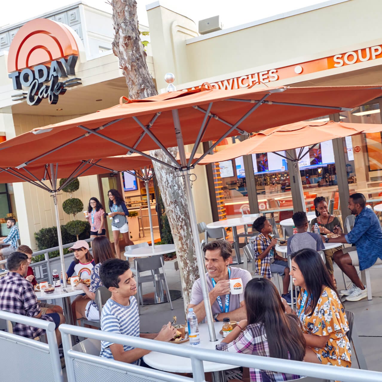 Guests enjoying the outdoor patio seating at the TODAY Cafe at Universal Studios Florida.