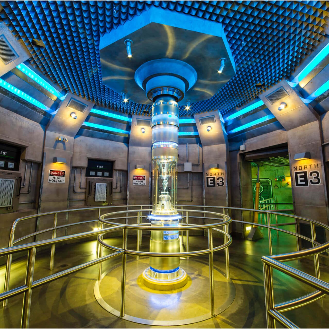 A piece of the AllSpark from the TRANSFORMERS movies sits in a tubular display case in the queue for TRANSFORMERS: The Ride 3D at Universal Studios Orlando.
