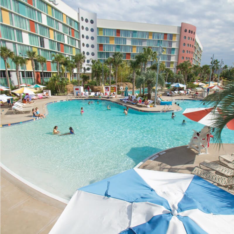 Lazy river courtyard pool and umbrella