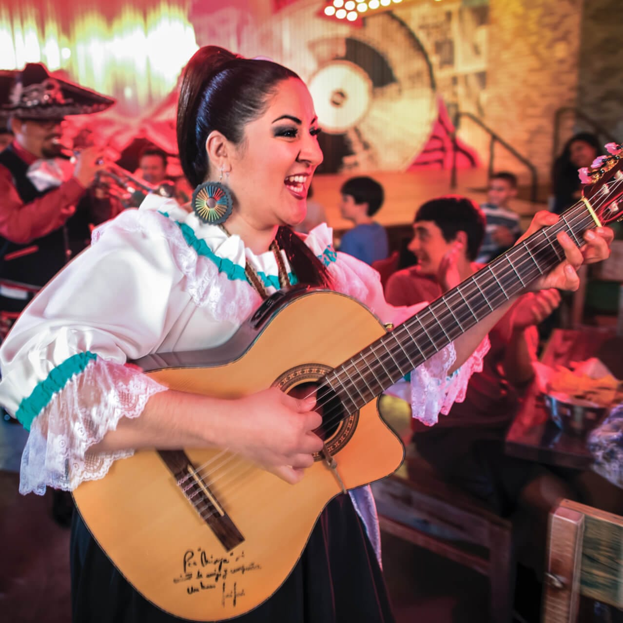 A guitar player plays in the Mariachi band at Antojitos Authentic Mexican Food in Universal CityWalk.