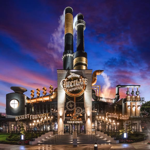 The exterior of Toothsome Chocolate Emporium and Savory Feast Kitchen, a full service restaurant at Universal CityWalk Orlando that serves an array of decadent dishes and delicious desserts.