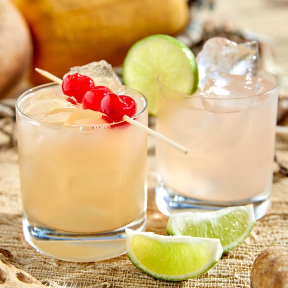 Cocktails garnished with cherries and limes from the Dockside Inn and Suites poolside bar.