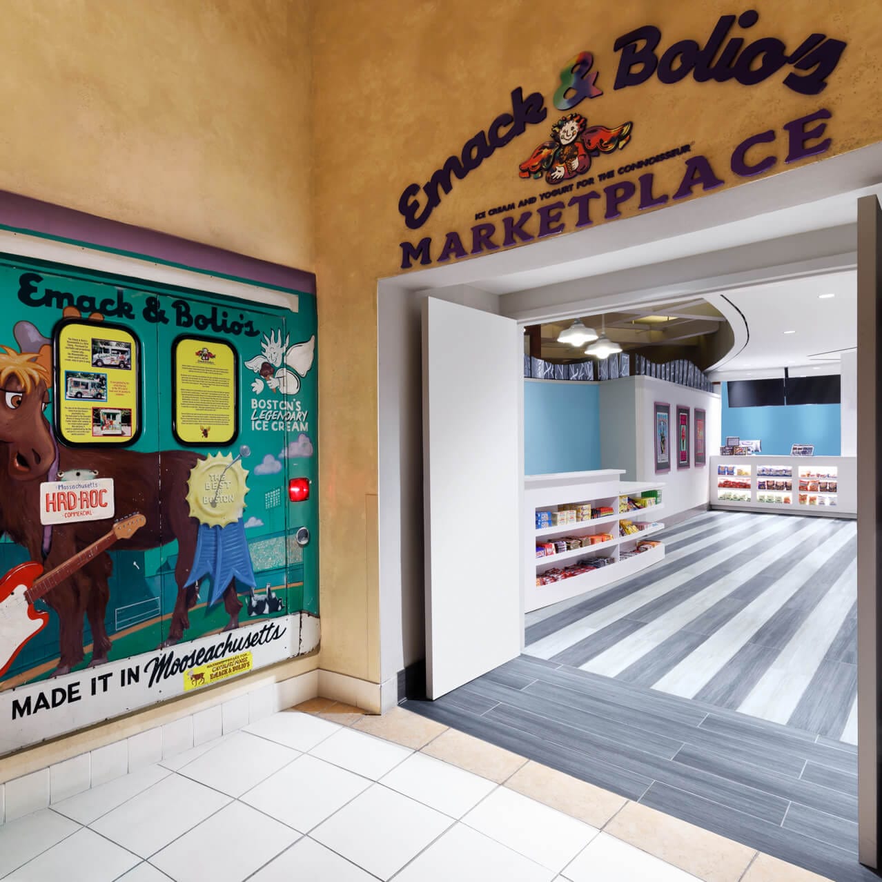 The entrance to Emack and Bolio's Marketplace at Hard Rock Hotel Orlando has a wall that looks like the back of an ice cream truck with a painted moose on it.