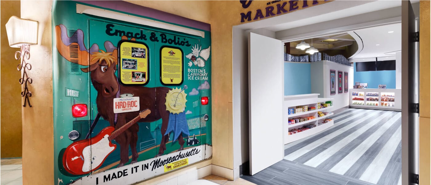 The entrance to Emack and Bolio's Marketplace at Hard Rock Hotel Orlando has a wall that looks like the back of an ice cream truck with a painted moose on it.