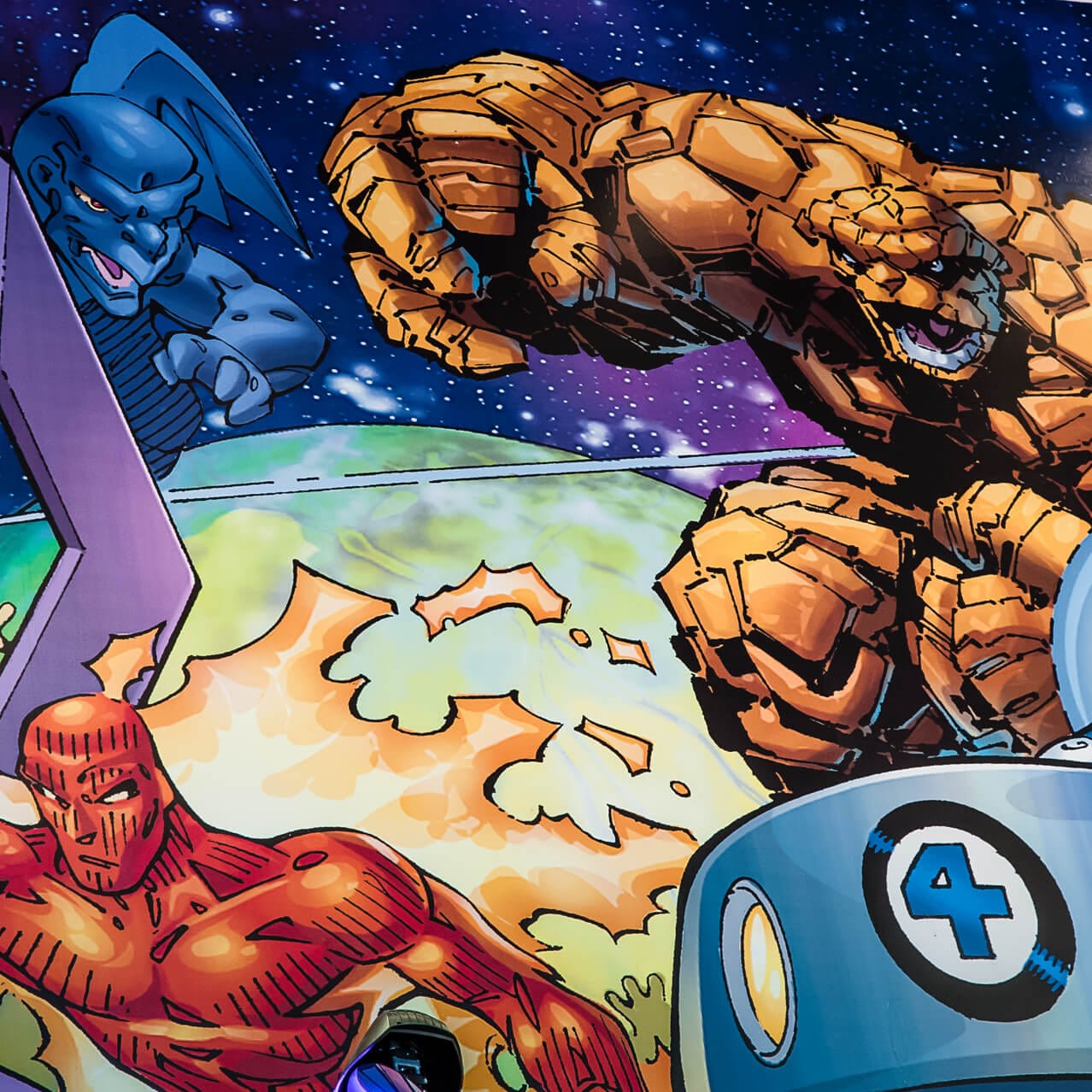 Close up view of the bright and colorful Marvel comic mural inside the Cafe 4 restaurant at Universal Orlando.