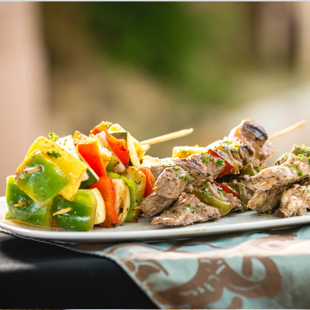 Colorful vegetable, beef, and chicken kebabs from Doc Sugrue's Desert Kebab House at Universal's Islands of Adventure in Orlando.