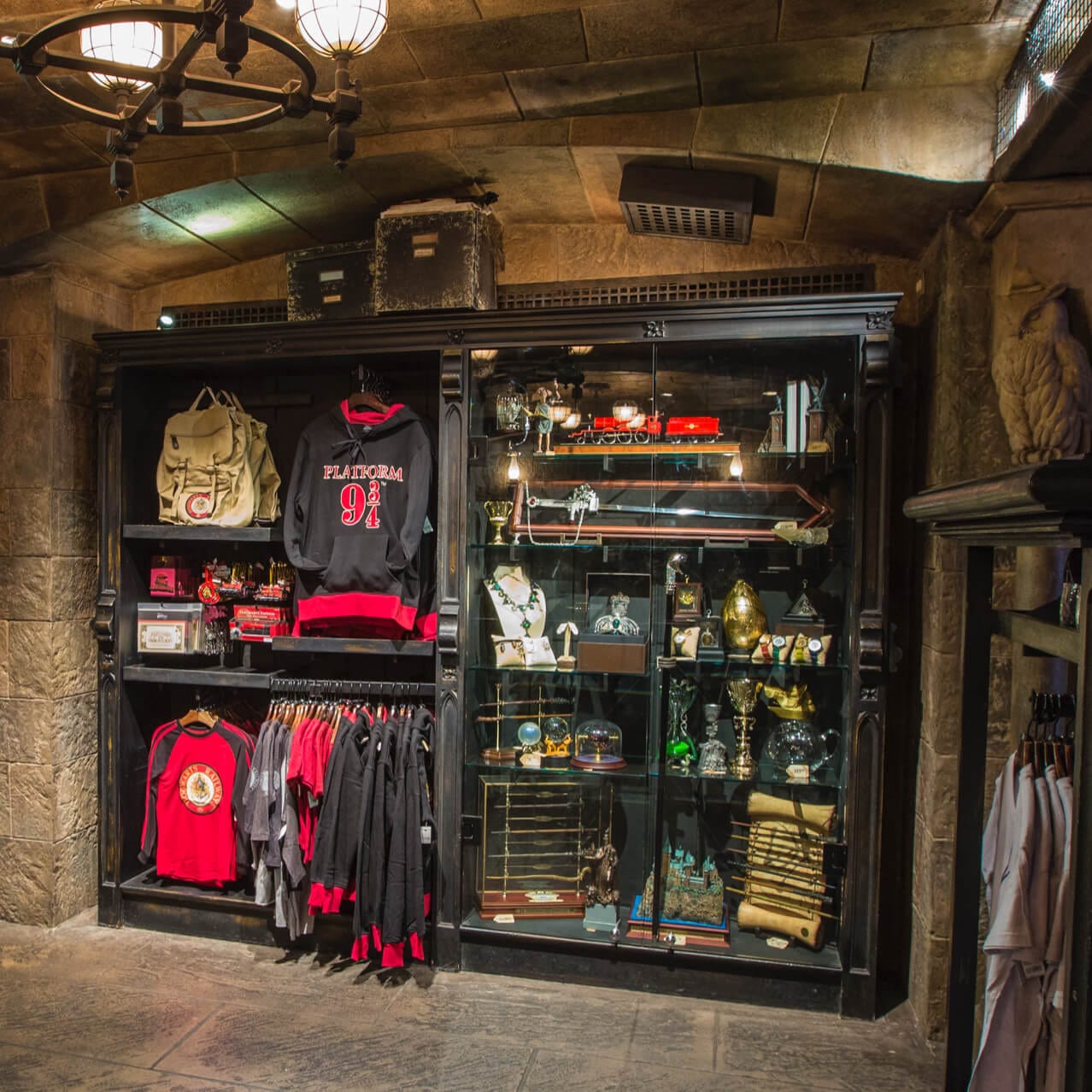 A display case of wizarding wares at Filch's Emporium of Confiscated Goods, a gift shop located inside Hogwarts castle in The Wizarding World of Harry Potter at Universal Orlando.