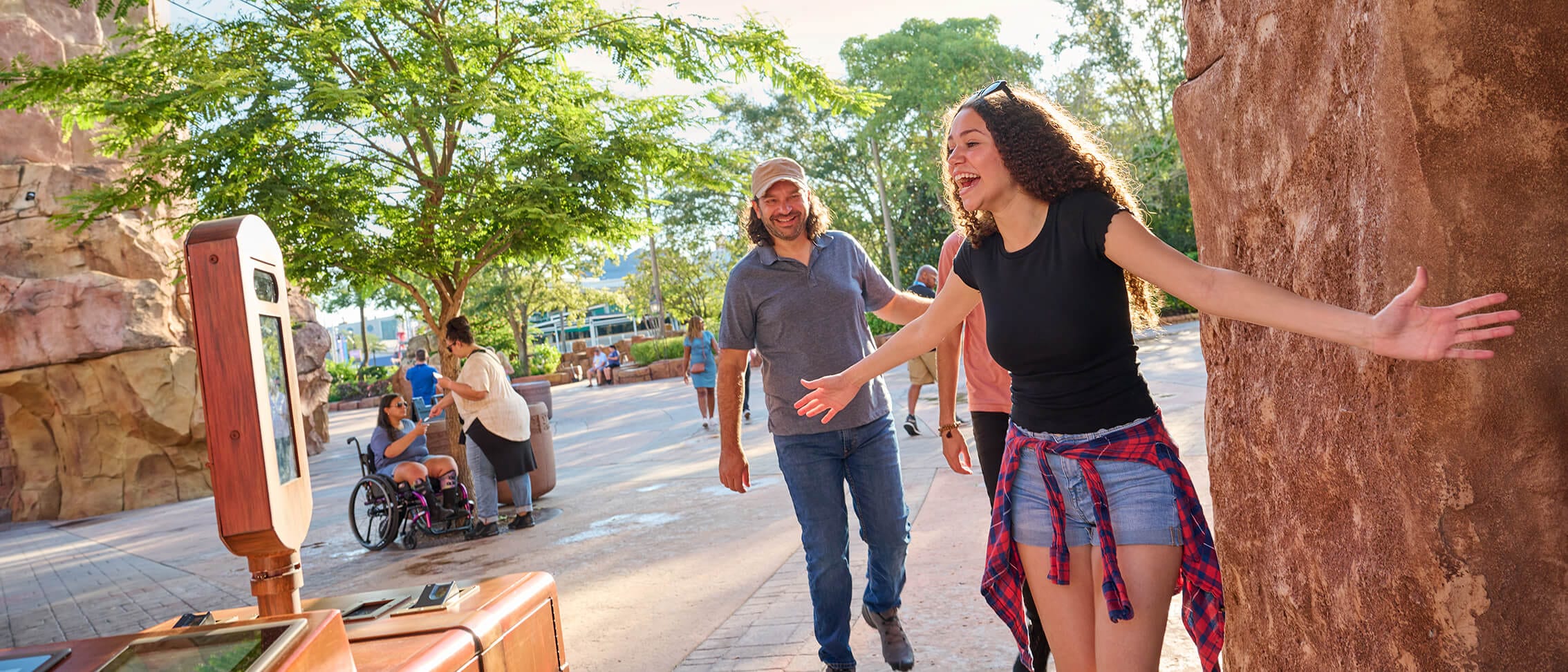 A group of friends smiling excitedly as they use Photo Validation to enter Universal Islands of Adventure.