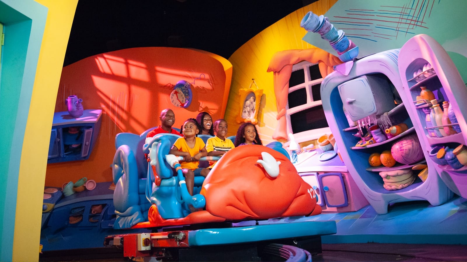 Family on The Cat in the Hat ride