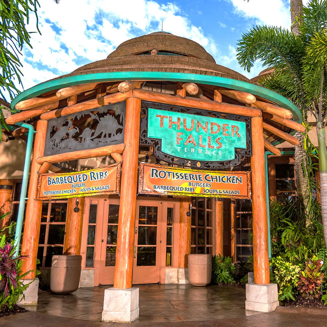 The exterior of Thunder Falls Terrace surrounded by tropical foliage in Universal's Islands of Adventure.