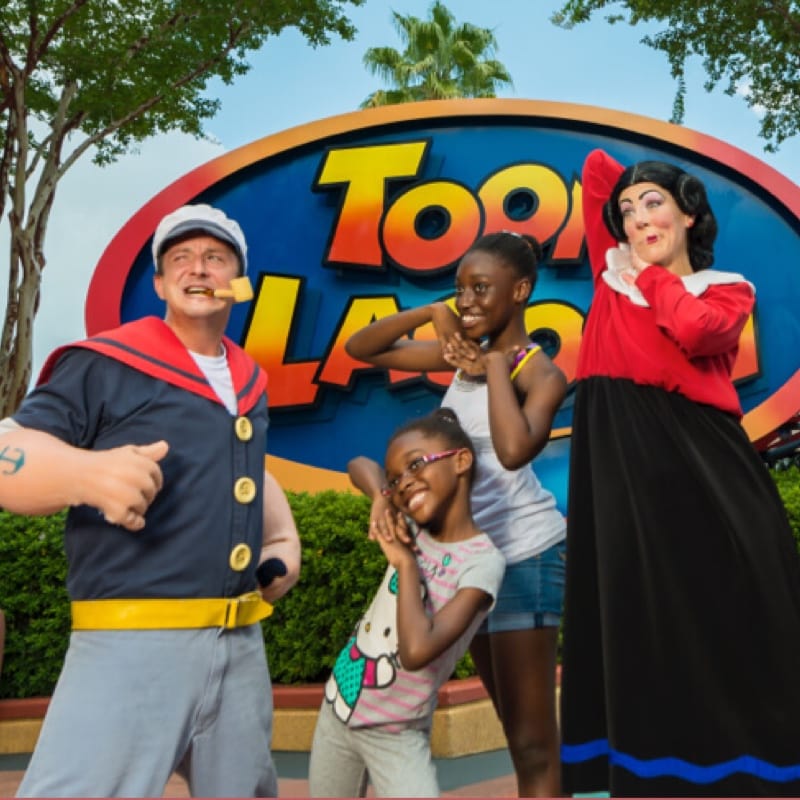 Popeye and Olive Oyl posing with guests
