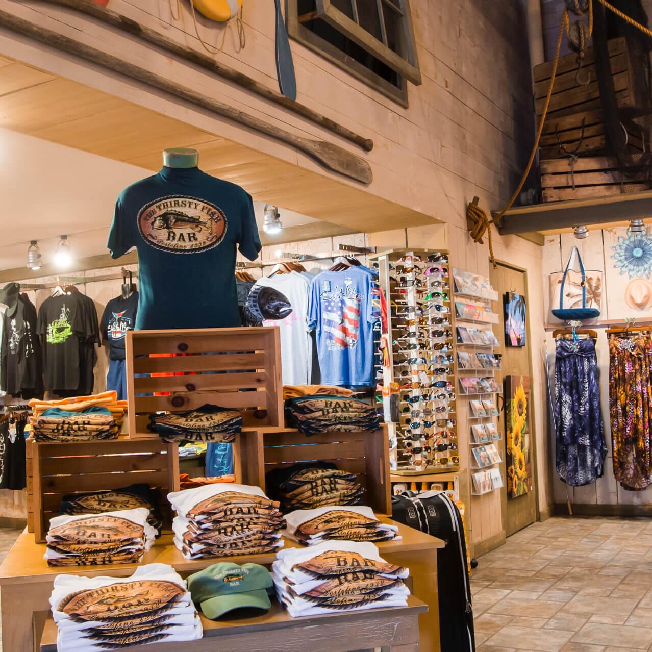 Tees, hats, sunglasses and other types of vacation wear on display inside L'Ancora at Loews Portofino Bay Hotel.