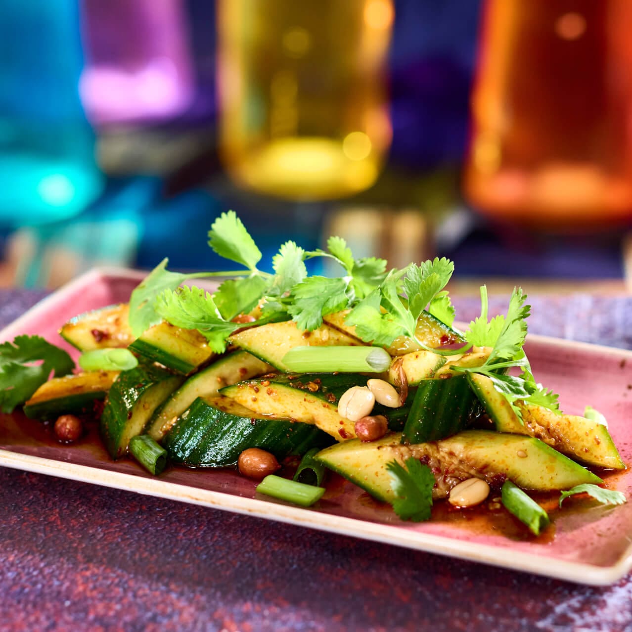 Smashed Cucumbers, a spicy cucumber salad is served at The Blue Dragon Pan-Asian Restaurant in Celestial Park.