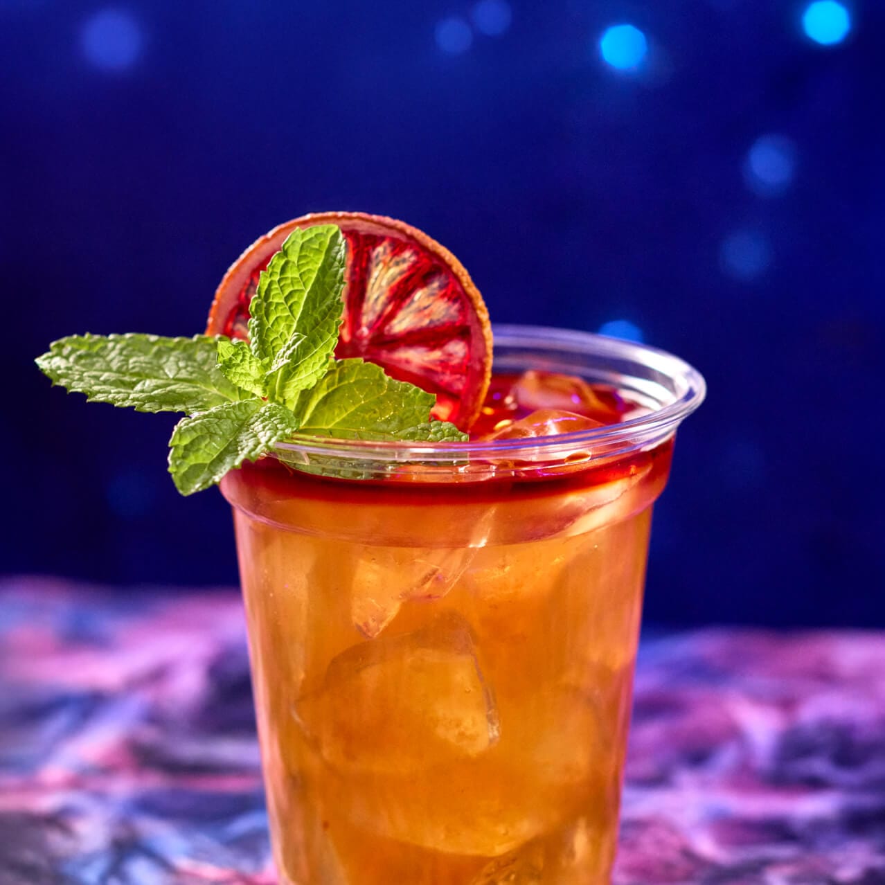 Waturi Punch, a refreshing rum cocktail with mint garnish, available at Celestiki in Celestial Park.