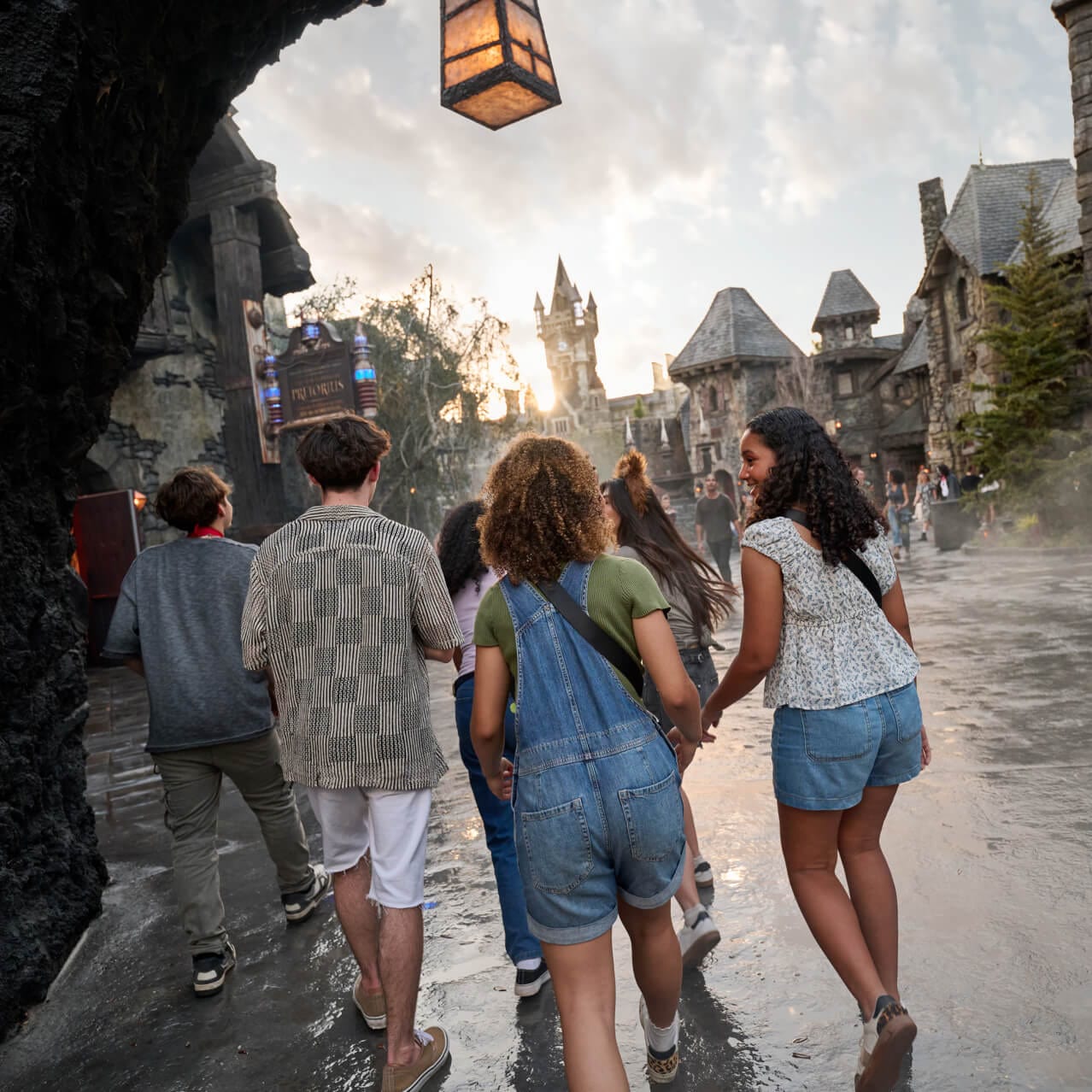 Guests entering Darkmoor Village in Dark Universe, with the Tudor-style buildings in the background.