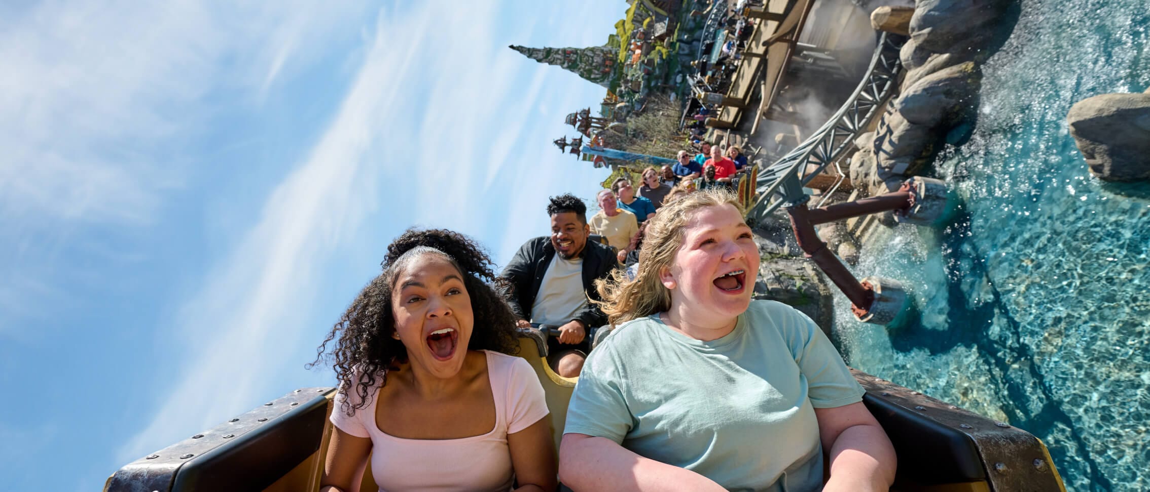 Guests enjoy the twists and turns on Hiccup’s Wing Gliders in How to Train Your Dragon - Isle of Berk.