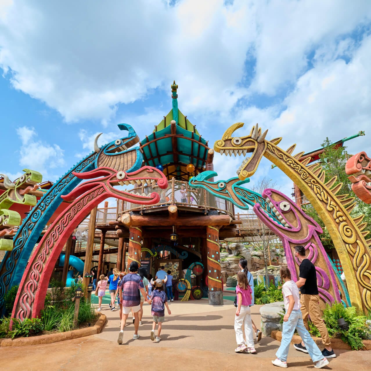 A colorful dragon archway sits at the entrance to the Viking Training Camp at How to Train Your Dragon - Isle of Berk