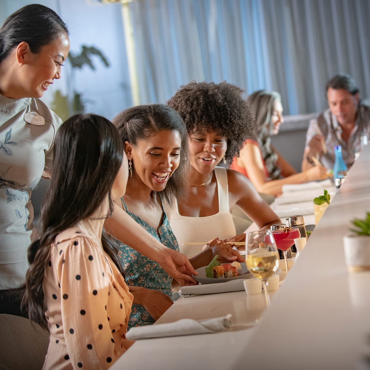 Diners at the Orchid Court Lounge & Sushi Bar at Loews Royal Pacific Resort in Universal Studios Orlando.