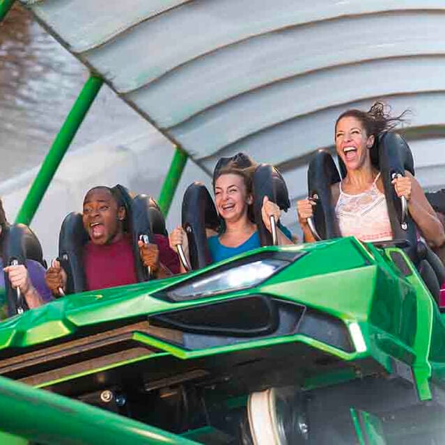 Guests riding the Incredible Hulk Coaster at Universal's Islands of Adventure