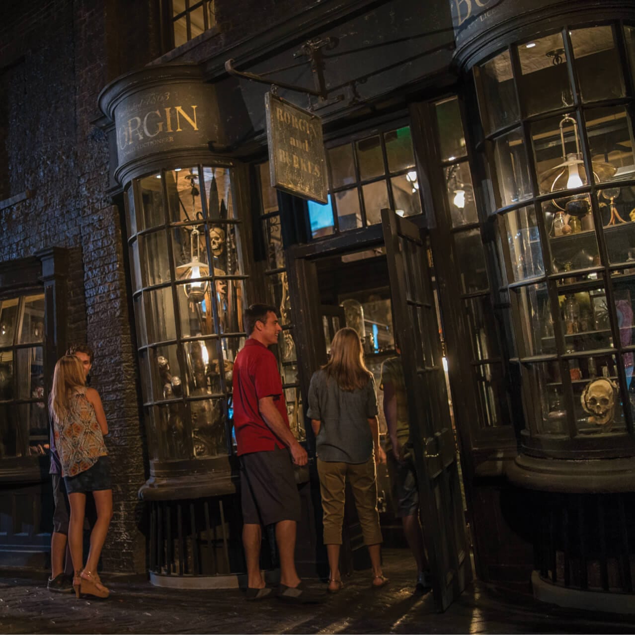 Guests outside of Borgin and Burkes shop in Diagon Alley at Universal Studios Orlando.